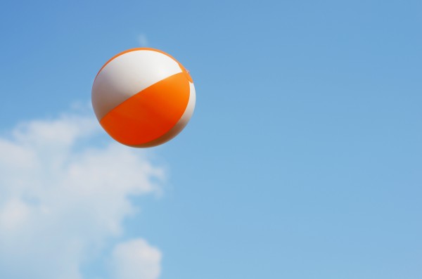 Beach ball on top of cloud by Codrina Miculit